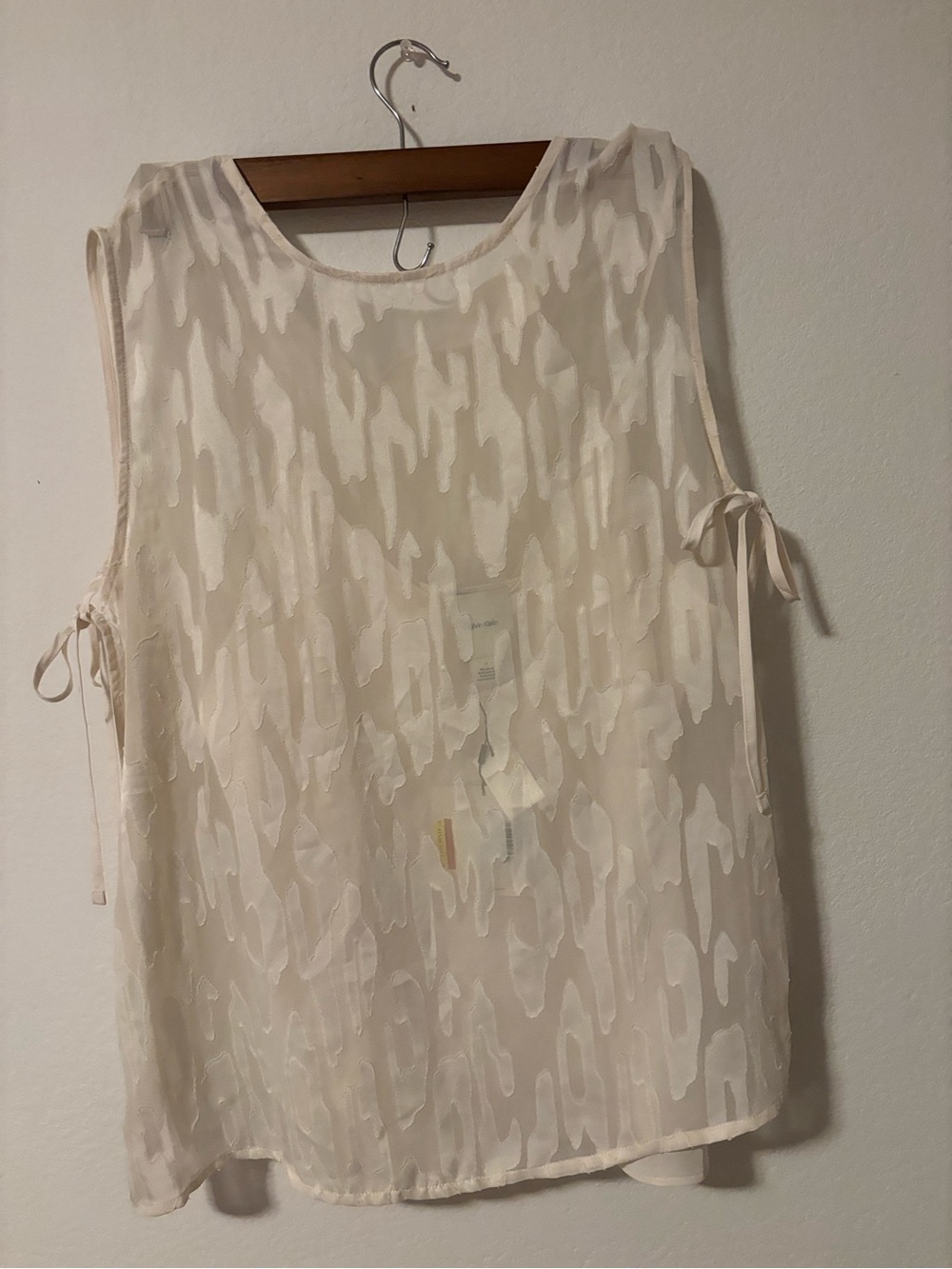 Calvin Klein Sheer Ivory Sleeveless Blouse with Side Ties